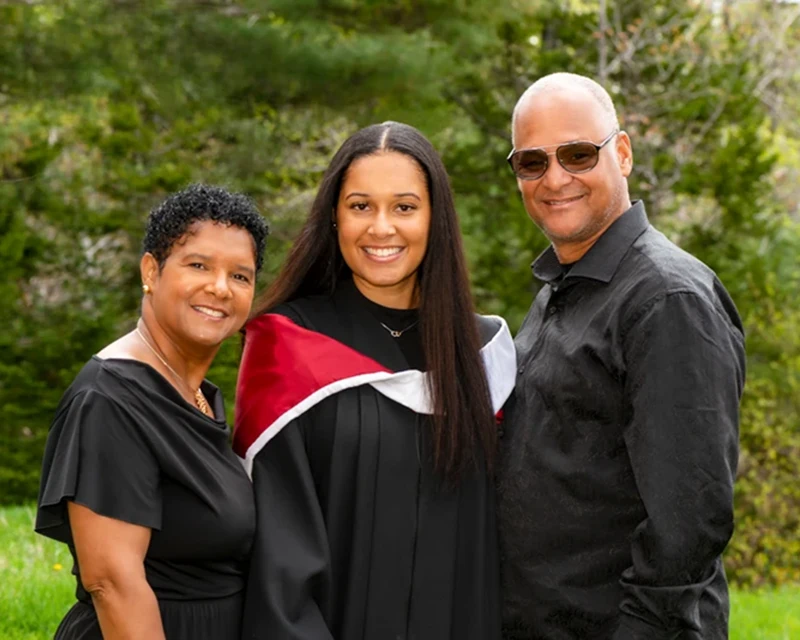 Halifax Graduation Photographer 11 Graduation portrait studio Halifax – proud graduate outdoors with authentic hood