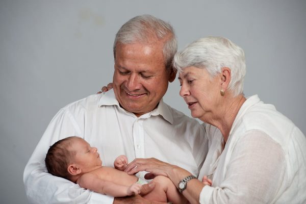 newborn baby with grandparents taken at our studio in Halifax